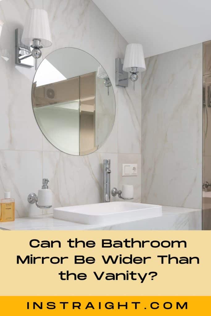 round mirror on top of the sink